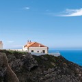 Portugal Algarve Sagres Leuchtturm auf Klippe