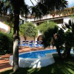 Pool Palmen und Garten der Villa Mediterranea