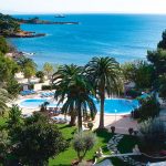 Pool und Meerblick des Hotel Son Caliu Hotel & Spa Oasis bei OLIMAR Reisen