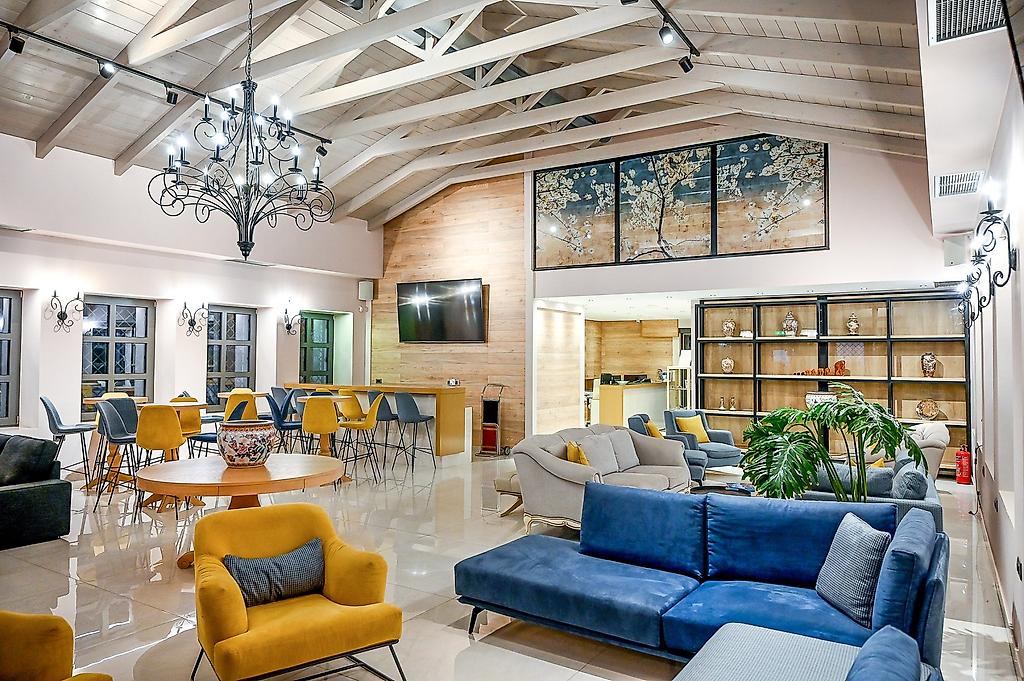 Adams Hotel Suites & Spa, Lobby mit Sitzgelegenheiten und Empfangsbereich