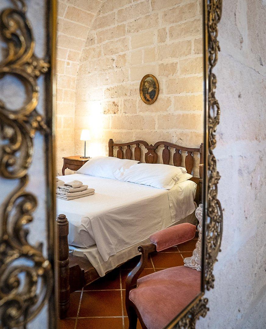 Masseria Scianne, Komfortables Superior-Zimmer mit gemütlicher Sitzecke in Apulien