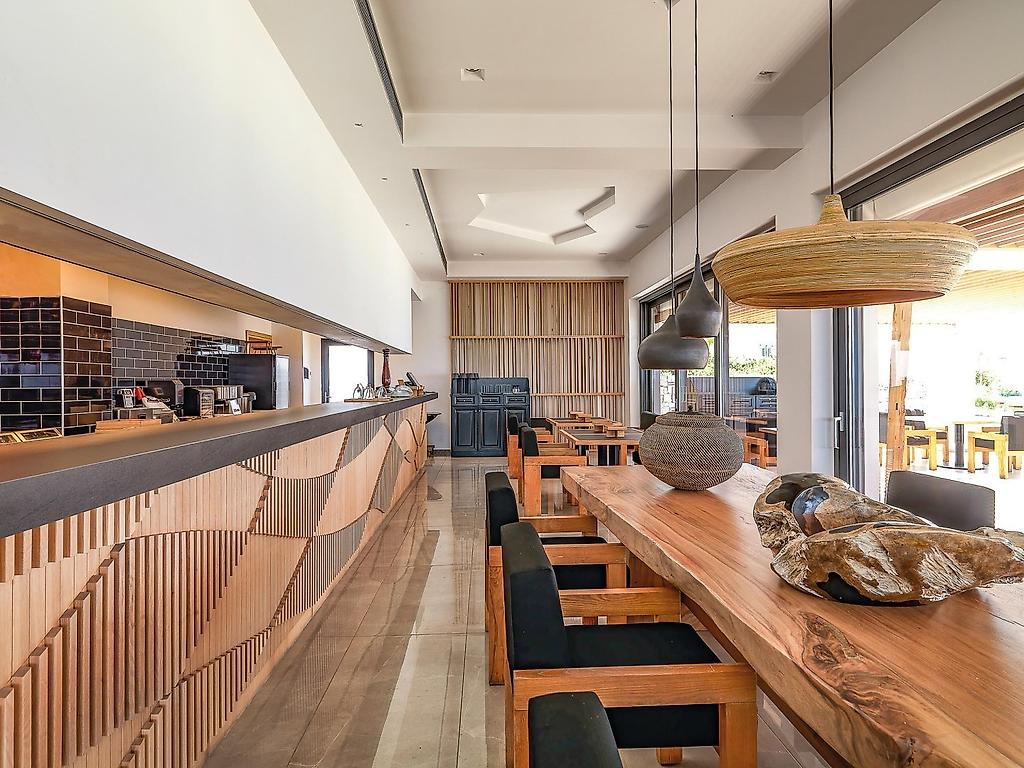Abaton Island Resort & Spa, Restaurant/Gastronomie