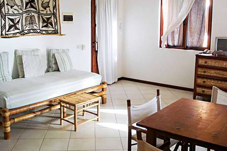 Aparthotel Cá Nicola, Wohnbereich und Tv Aparthotel Cá Nicola, Wohnbereich und Tv