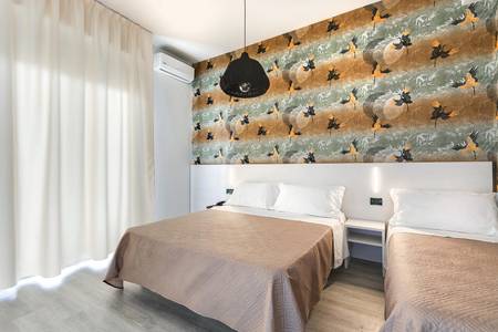 Executive Evolution Hotel, Dreibettzimmer