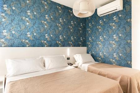 Executive Evolution Hotel, Dreibettzimmer