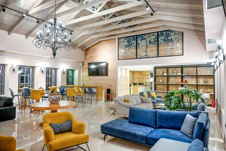 Adams Hotel Suites & Spa, Lobby mit Sitzgelegenheiten und Empfangsbereich