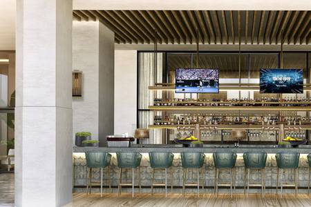 Four Points by Sheraton São Vicente Resort, Bar am Meer mit hohen Barhockern und direktem Blick auf die Brandung.