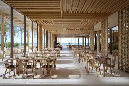 VOI Vila Do Farol Resort, Gemütliche Sitzecke im Restaurant mit ansprechender Tischdekoration.
